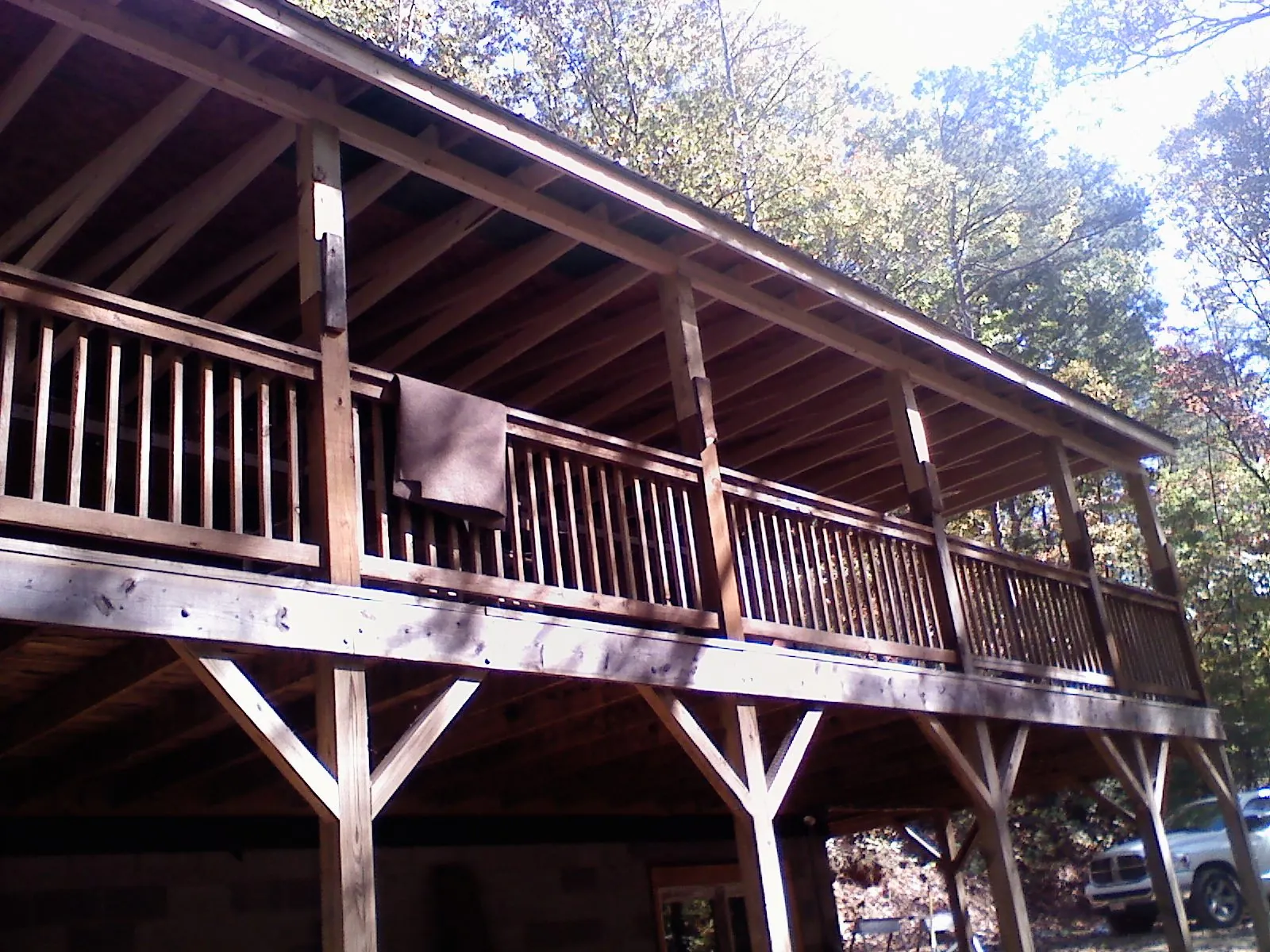 Timber framing under a new elevated porch and deck — Roof Leak Repair in Spofford by Roofing Brothers